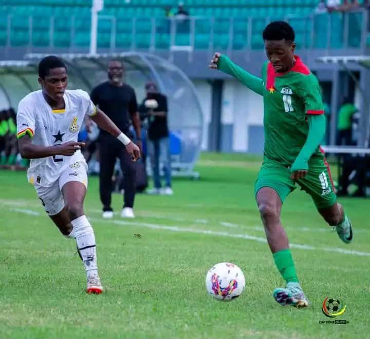 International footballers competing for the ball